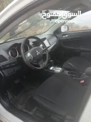  4 ميتسوبيشي لانسر. 2015 اصل برايفت   رخصة وتامين  ماطور 1600 اتومات  شامل  فتحة