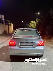  2 سيارة ميتسوبيشي لانسر 2004 محدثه بلكامل 2013