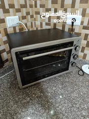  4 فرن كهربائي بحال الوكالة