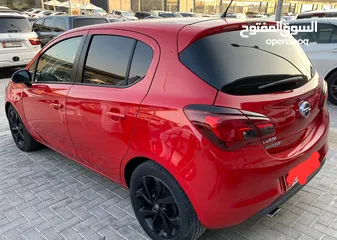  11 اوبل كورسا 2015 احمر خليجي Opel Corsa 2015, Gulf red