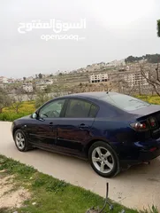  2 مازدا شلوش مشطوب متور قير جداد  شاشه  جنط مغنيسيوم  حبتها عليها  هيئه