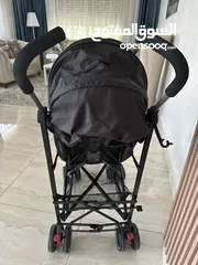  9 عرباية  اطفال mothercare لون اسود ورمادي