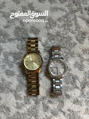  13 Michael Kors and Armani Exchange Women’s watches. Used but in good condition.