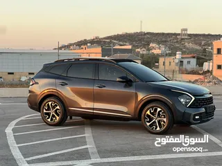  7 كايا سبورتاج  2022 فل الفل فتحة سقف  2x4 ///240Hp بنزين + كهرباء  ( Haybrid) 1600cc