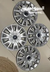  1 Original Ford wheel covers