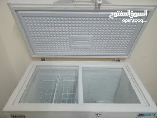  6 فريزر نيوتن ناشونال بطح  300 لتر مع 2 سلال و أبواب زجاج وموفر طاقة ++A