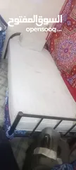  1 Single bed with high medical mattress