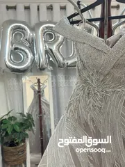  3 فستان سهرة فضي لامع ببطانة نهدي فاتح  مميز و ثقيل يناسب اخت عروس او اخت عريس  قماشته واقفة و جميلة