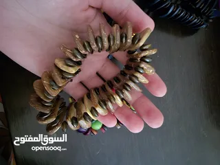  11 اساور خشبية ملونة جديدة