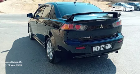  7 متسوبيشي لانسر فراشة موديل 2015 فحص مرفق مع الصور بحالة الوكاااااالة  ماشية 49 الف km  أصلي