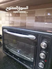 1 فرن كهربا لون اسود عدد واحد
