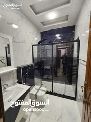  14 شقه جديده طابق اول هندسي(طابقيه ) سوبر ديلوكس