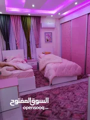  2 شقه ارضيه بشارع الاردن حي المنصور 176متر داخلي وخارجي 100