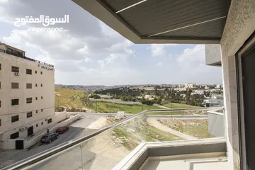  6 شقة مميزة طابق ثالث مع روف مساحة 160متر مع روف50 مترفي شمال عمان الجبيهة-حي المنصور مشروع BO517