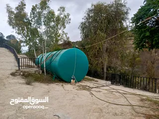  3 مزرعه مع 2 بيت ريفي مخدومه ماء وكهرباء مساحتها 4712