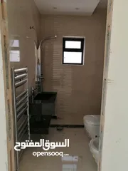  2 شقة طابقية للبيع  الدوار السابع حي الروابي 325م