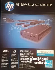  1 شاحن لابتوب Hp أصلي مع مخرج USB للبيع