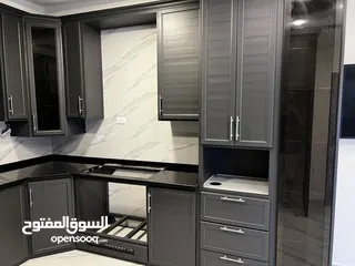  21 مطابخ خشب  مطابخ اللمنيوم أماراتي بجميع الألوان بكفالة 10 سنوات