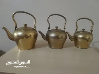  1 اباريق شاي نادر وقديم قاعده عريضه وعنق طويل مائل..