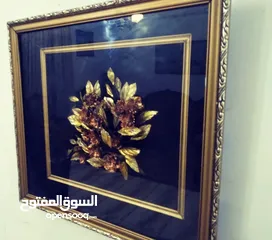  21 لوحات  رسم زيتي.. وتطريز