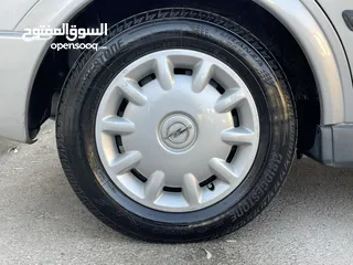  30 ‎أوبل استرا موديل 2001  وارد الوكالة ومالك واحد فقط من الشركة عداد 100الف كيلو فقط
