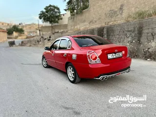  15 سياره هونداي النترا2004 لون احمر