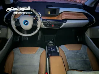  9 BMW i3 2014 فحص كامل تقطع بالشحنه الواحده 120 كم ممشى قليل 77الف كم