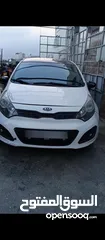  2 Kia Rio 2012  خاليه من الضربات  متور 1400 ديزل  تيربو جير متور هيئه ميه الميه