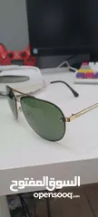  2 Prada porche sunglasses