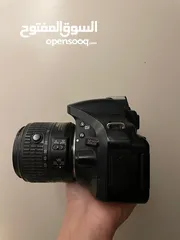  2 كاميرا نيكون D5200 مع عدستها بحالة ممتازة