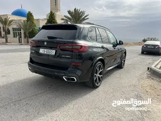  8 بي ام دبليو X5 لون اسود موديل 2022 Mكيت فل كامل فحص كامل وارد وكاله عمان