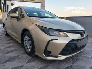  9 تويوتا كورولا 2021 لون شمباني بنزين اصلي ماتور cc1600 فحص كامل جمرك حديث
