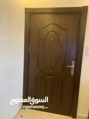  2 باب خشب خارجي مع عين سحريه