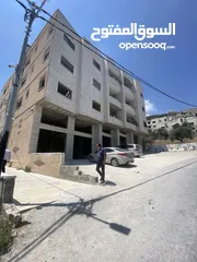 1 شقق عظم للبيع ومحلات تجاريه على شارع القدس نابلس قريب من بطاريات الشكعة
