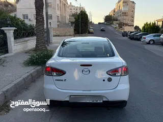  10 مازدا زوم 2 موديل 2012 فحص كامل 7 جيد ولا ملاحظة لون ابيض قاطعة مسافة 100 الف كيلو فقط (استخدام شخصي