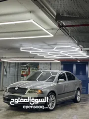  1 سكودا اوكتافيا بنزين اوتماتيك اصل حكومي مطور 1.6 بحالة الوكاله موديل 2007