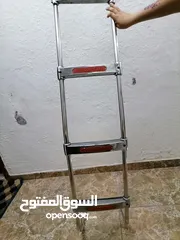  8 لوازم باص ستاريكس سلم+ مقاعد حديد منجد جلد عدد 2 +مواسير سفلية عدد 2
