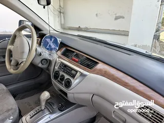  12 لانسر موديل 2004 ماتور 1600 فحص مرفق