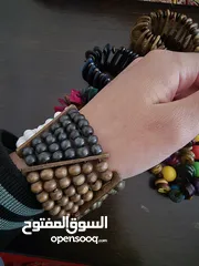  16 اساور خشبية ملونة جديدة