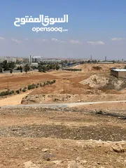  1 للبيع ارض بجانب جامعة اربد الاهلية مع اجمل اطلالة ومقابل جامعة جدارا مفروزة قوشان مستقل شارعيين