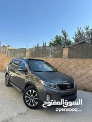  8 كيا سرنتو 2015ترخيص2014 للبيع المعني حيا الله ترخيص وتأمين هديه سنه الجب بحاله ممتازه  فل الفل الجيب