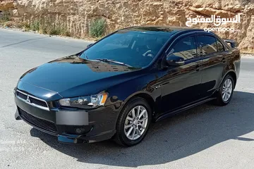  1 متسوبيشي لانسر فراشة موديل 2015 فحص مرفق مع الصور بحالة الوكاااااالة  ماشية 49 الف km  أصلي
