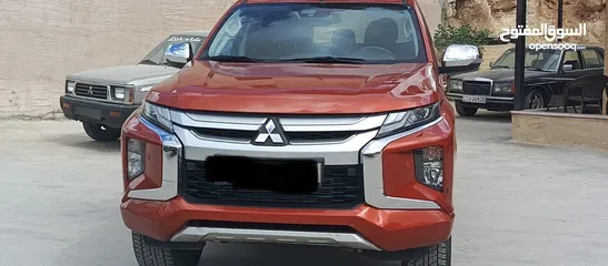  8 ميتسوبيشي سبيرتيرو L200 2021  فحص كامل (3/كاميرات) يمكن التمويل عن طريق المعرض بدفعه أولى 11000 الف
