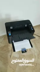 6 طابعة ليزر ويرلس اسود شبه جديدة مع حبر جديد فل   .