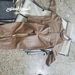  4 بدلات مطر منوعة جلد + وجواكت مطر جلد + وجواكت مطر كوري.