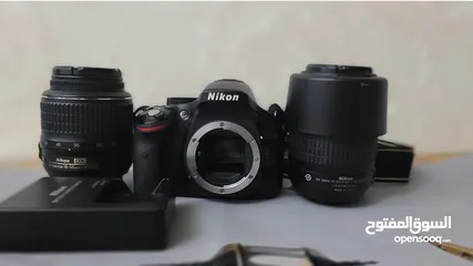  7 كاميرا نيكون D5200 مع عدستين(18-55)mm  و (55-200)mm