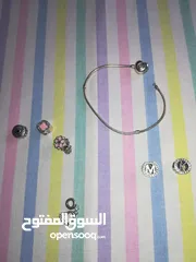  2 اسواره باندورا أصلية مع تشارلز موضح ب الصورة وزن 23 غرام للبيع مع حلق فضة 925 بسعر مناسب