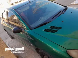  5 بيجو 206. موديل 2003 للبيع قير عادي