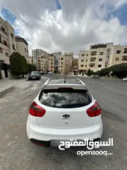  10 كيا برايد هاتش باك موديل 2014 فحص 4 جيد سعة الموتور 1600 سي سي الشكل رياضي لون ابيض سقف اسود