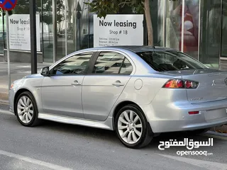  21 لانسر  فحص كامل 7جيد1.6محرك اقتصادي جير أوتوماتيك كت رالي ارت ياباني اصلي كراسي جلد وقماش الياباني